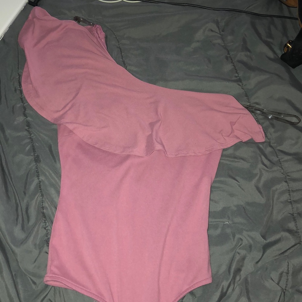 One sleeve over the collared bodysuit top